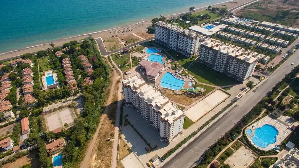 Апартаменты в Мерсине, Турция. Инвестиции + отдых у моря - Фото 0