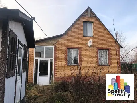 Добротный дом с участком