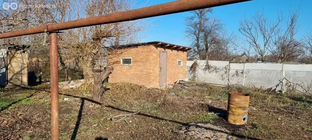 Участок в станица Новотитаровская, Октябрьская улица, 125 (7 м) - Фото 1