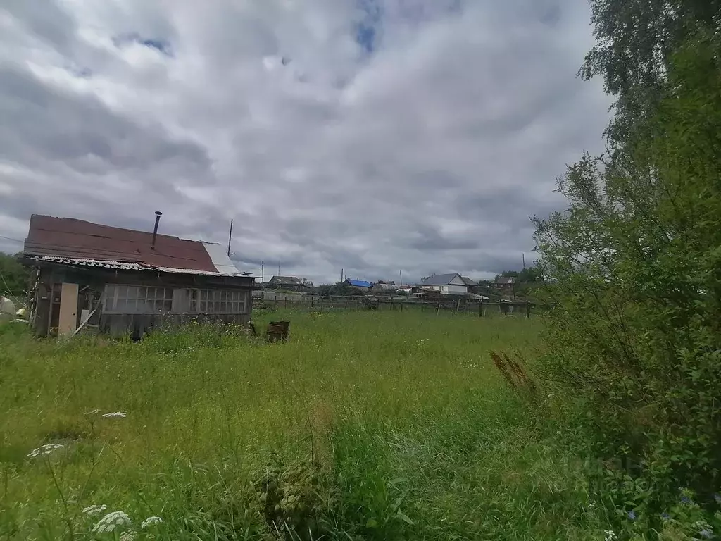 Участок в Иркутская область, Усть-Илимский муниципальный округ, пос. ... - Фото 1