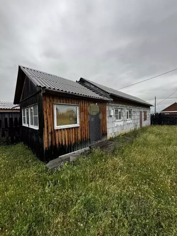 Дом в Иркутская область, Эхирит-Булагатский район, пос. Усть-Ордынский ... - Фото 1