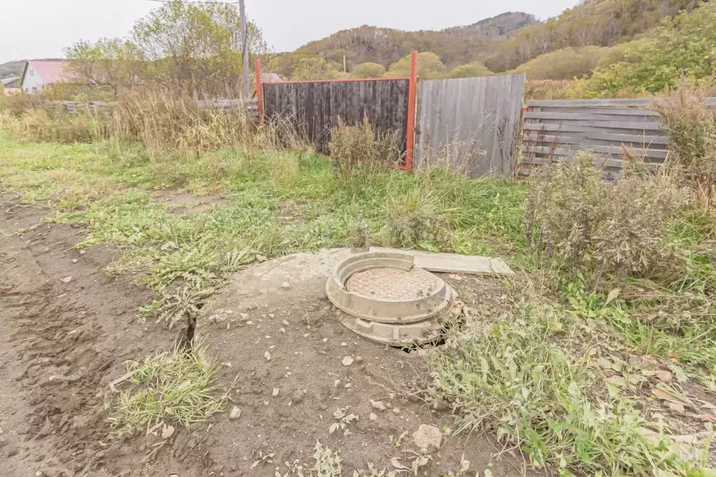 Участок в Сахалинская область, Холмский городской округ, с. Яблочное ... - Фото 1