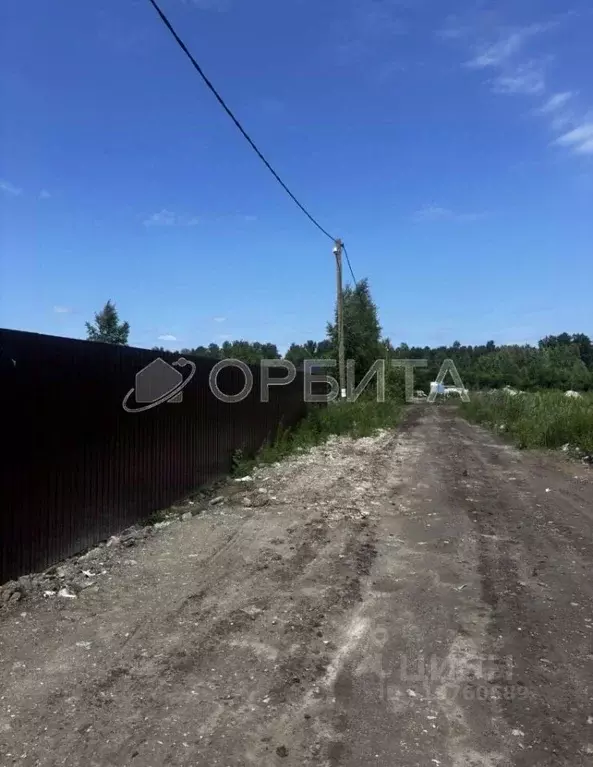 Участок в Тюменская область, Тюмень СОСН Ландыш тер., ул. Полевая ... - Фото 1