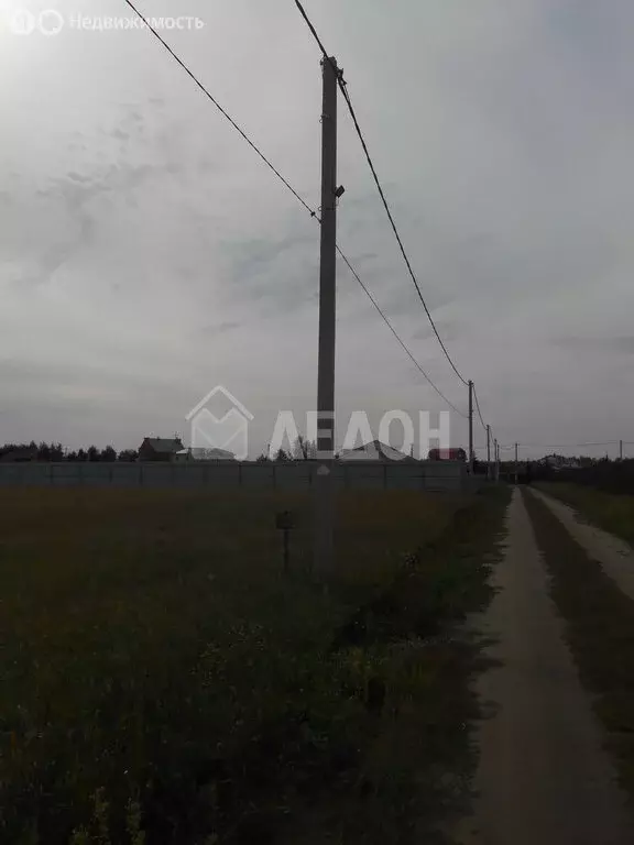 Участок в село Усть-Заостровка, Узкая улица (15 м) - Фото 1