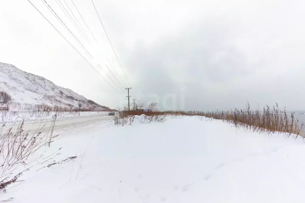 Участок в Сахалинская область, Холмский городской округ, с. Прибой ул. ... - Фото 1