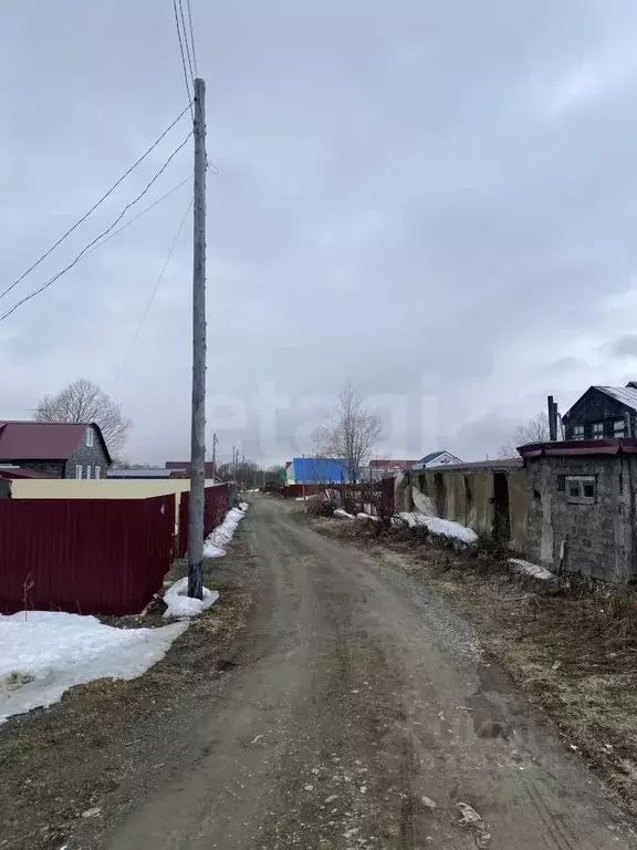 Участок в Сахалинская область, Южно-Сахалинск городской округ, с. ... - Фото 1