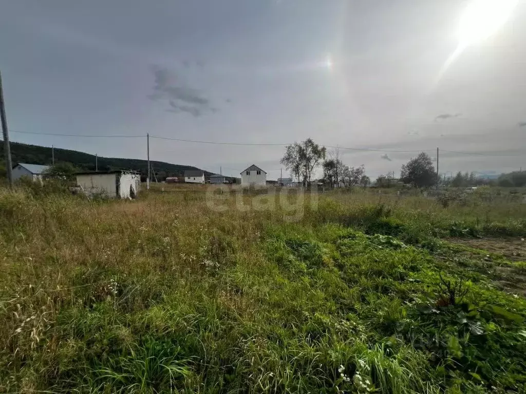 Участок в Сахалинская область, Южно-Сахалинск городской округ, с. ... - Фото 1