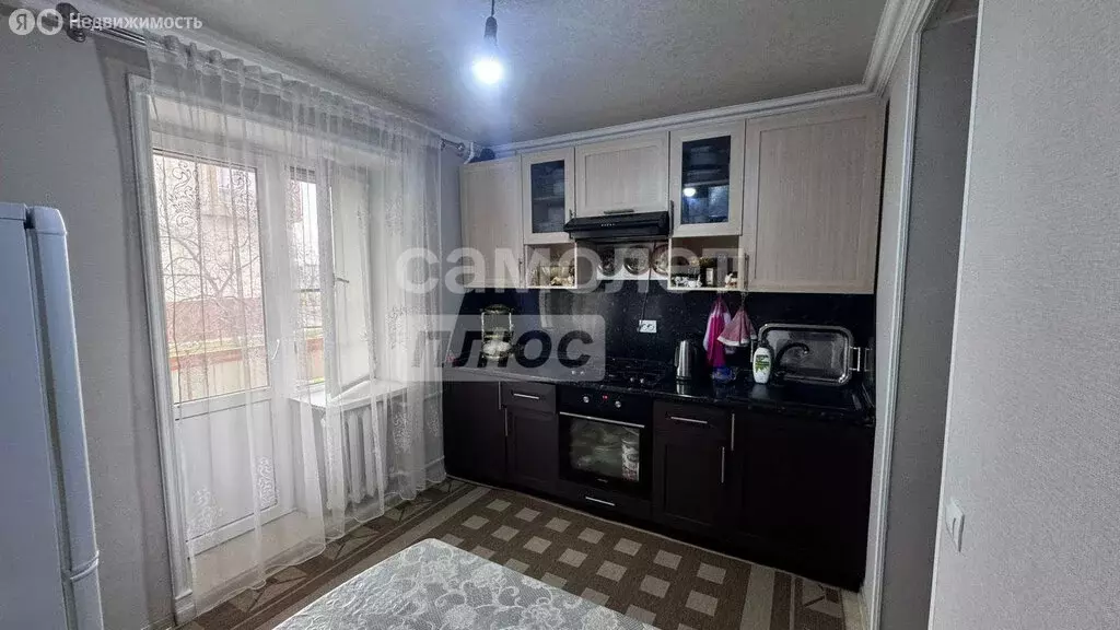 3-комнатная квартира: Грозный, улица М. Н. Нурбагандова, 16 (69 м) - Фото 1