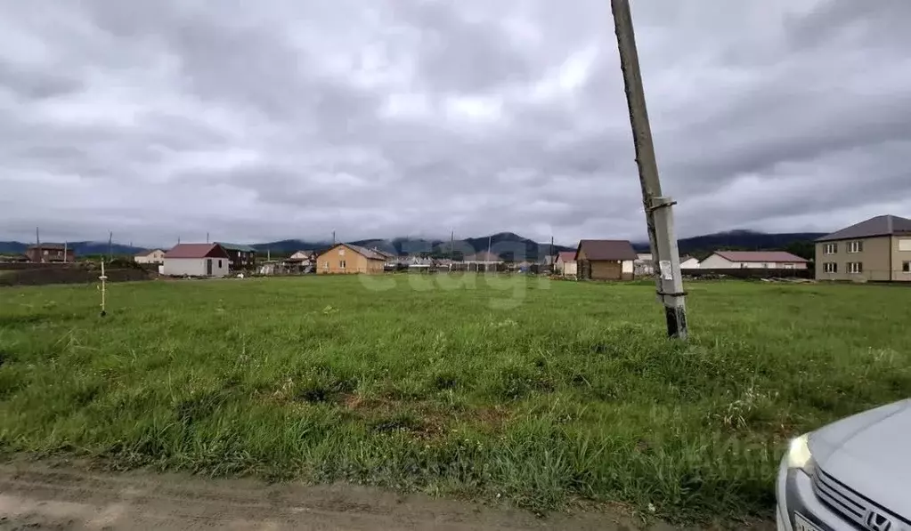 Участок в Сахалинская область, Южно-Сахалинск городской округ, с. ... - Фото 1