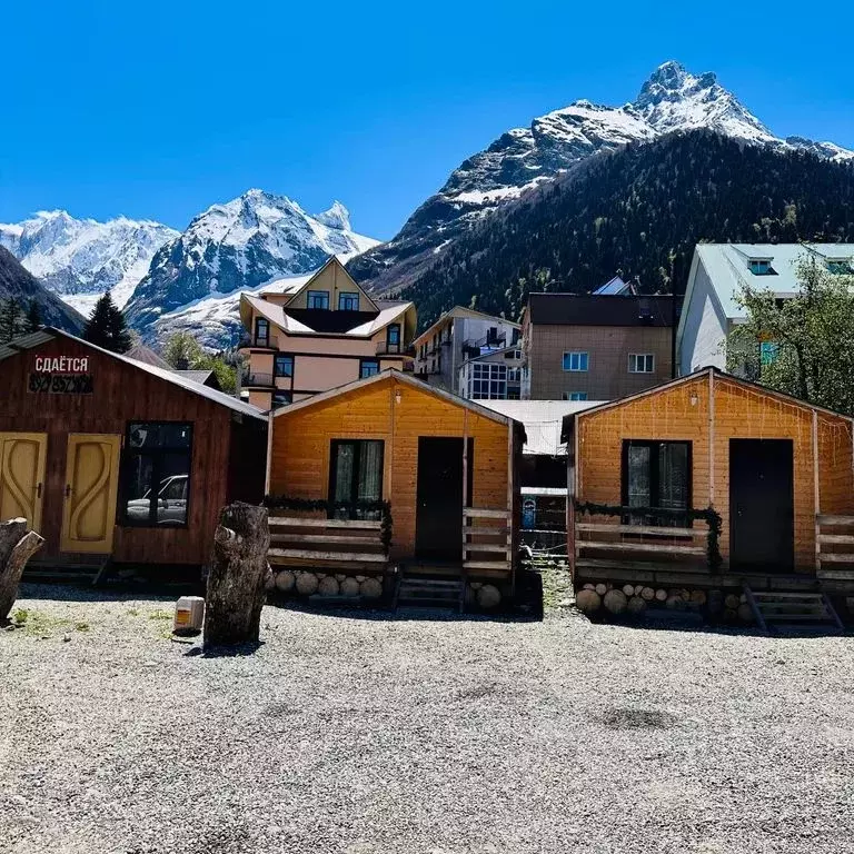 Дом в Карачаево-Черкесия, Домбай кп ул. Карачаевская, 90 (25 м) - Фото 0