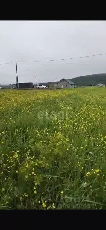 Участок в Сахалинская область, Южно-Сахалинск городской округ, с. ... - Фото 1