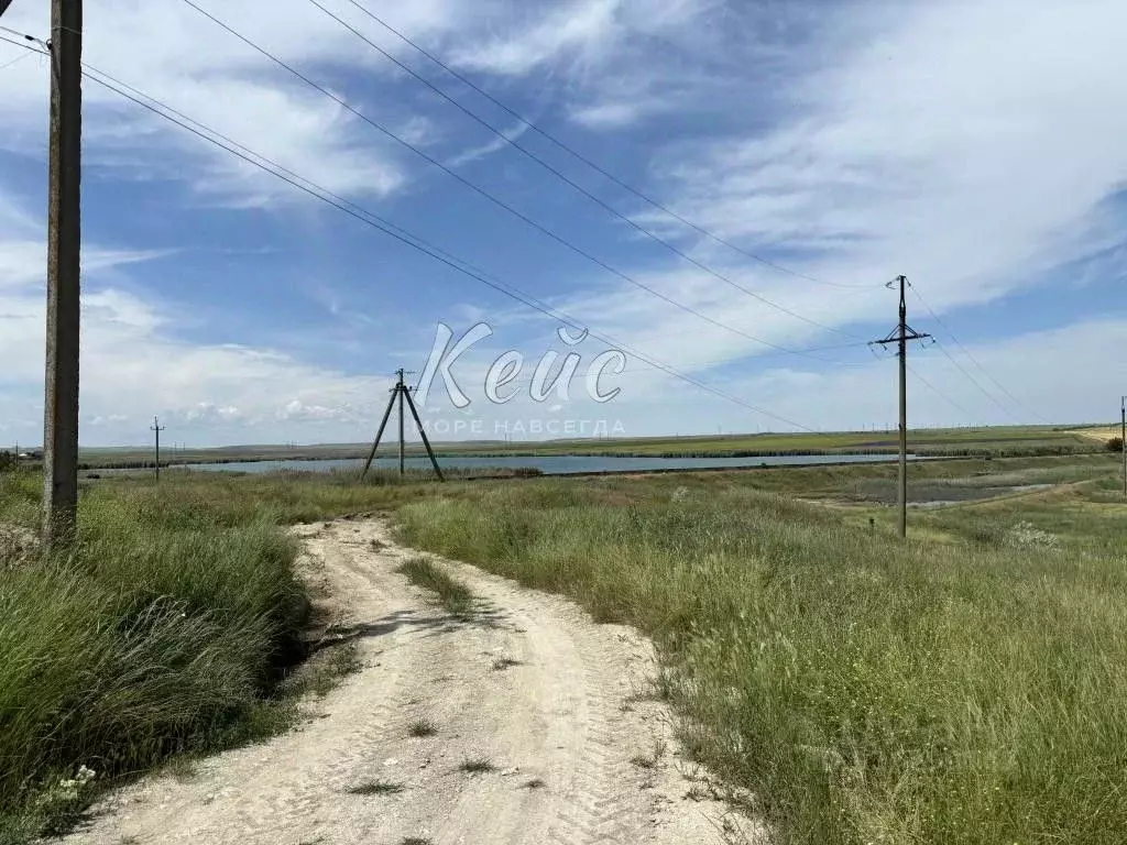 Участок в Крым, Феодосия Колос СПК, ул. Приозерная (7.5 сот.) - Фото 1