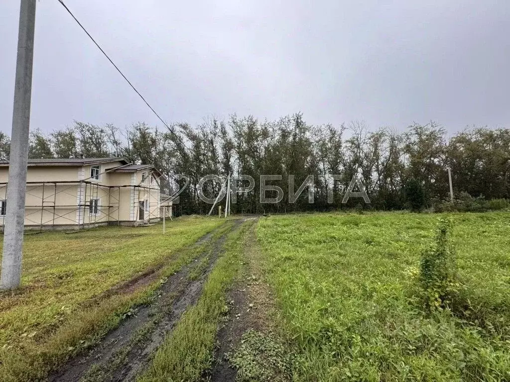 Участок в Тюменская область, Тюмень ул. Изобильная (6.0 сот.) - Фото 1