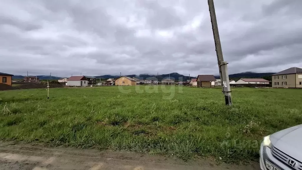 Участок в Сахалинская область, Южно-Сахалинск городской округ, с. ... - Фото 1