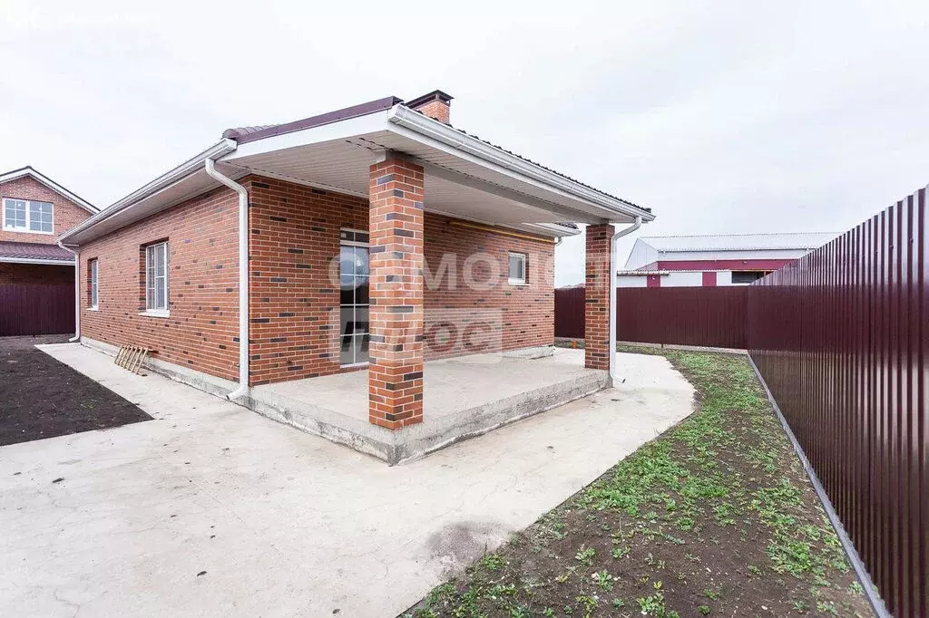Дом в станица Новотитаровская, улица 8 Марта, 21 (100 м) - Фото 1
