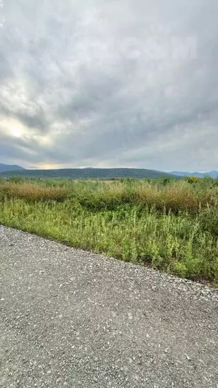 Участок в Сахалинская область, Южно-Сахалинск городской округ, с. ... - Фото 1