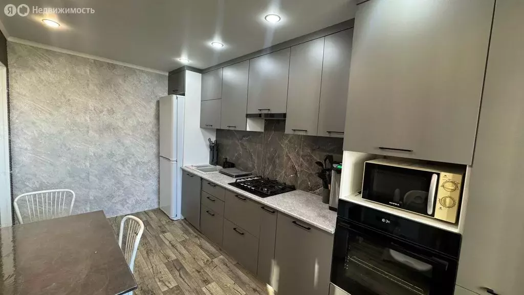 4-комнатная квартира: Октябрьский, 35-й микрорайон, 34 (76.5 м) - Фото 2