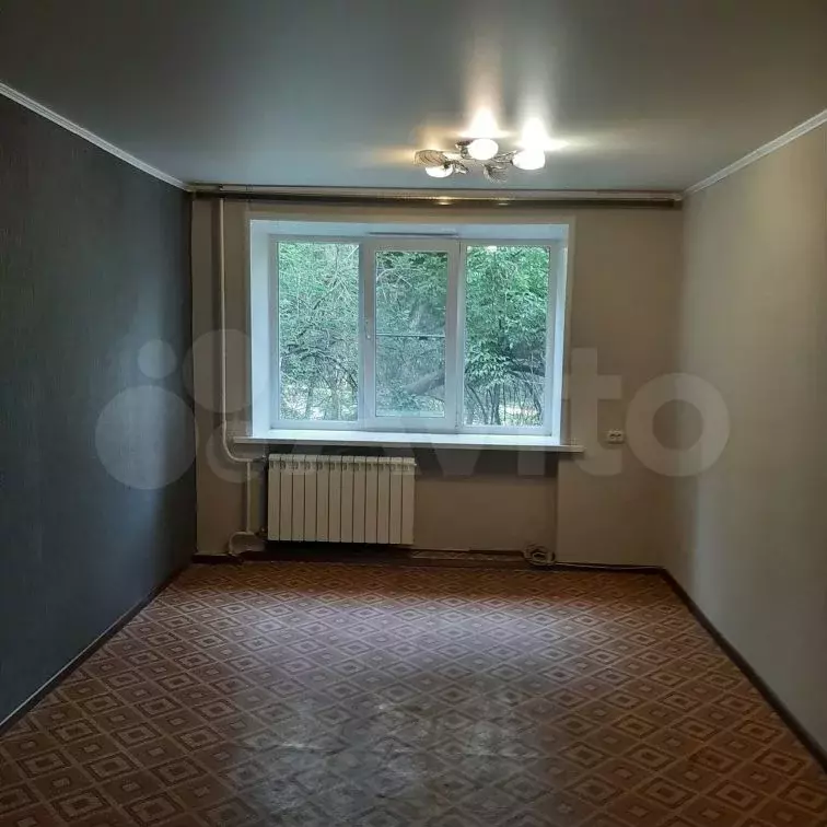 Комната 18,8 м в 1-к., 2/5 эт. - Фото 1