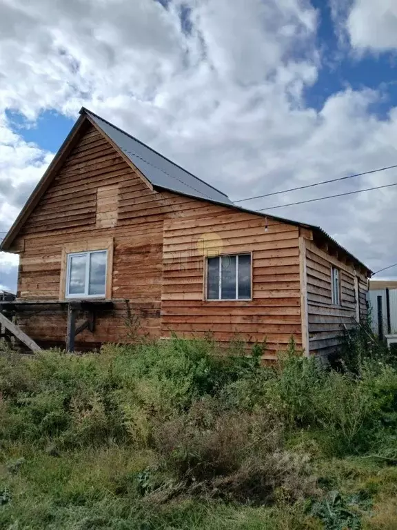 Дом в Иркутская область, Эхирит-Булагатский район, пос. Усть-Ордынский ... - Фото 1