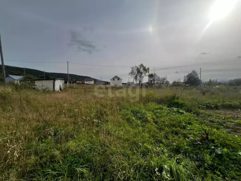 Участок в Сахалинская область, Южно-Сахалинск городской округ, с. ... - Фото 1
