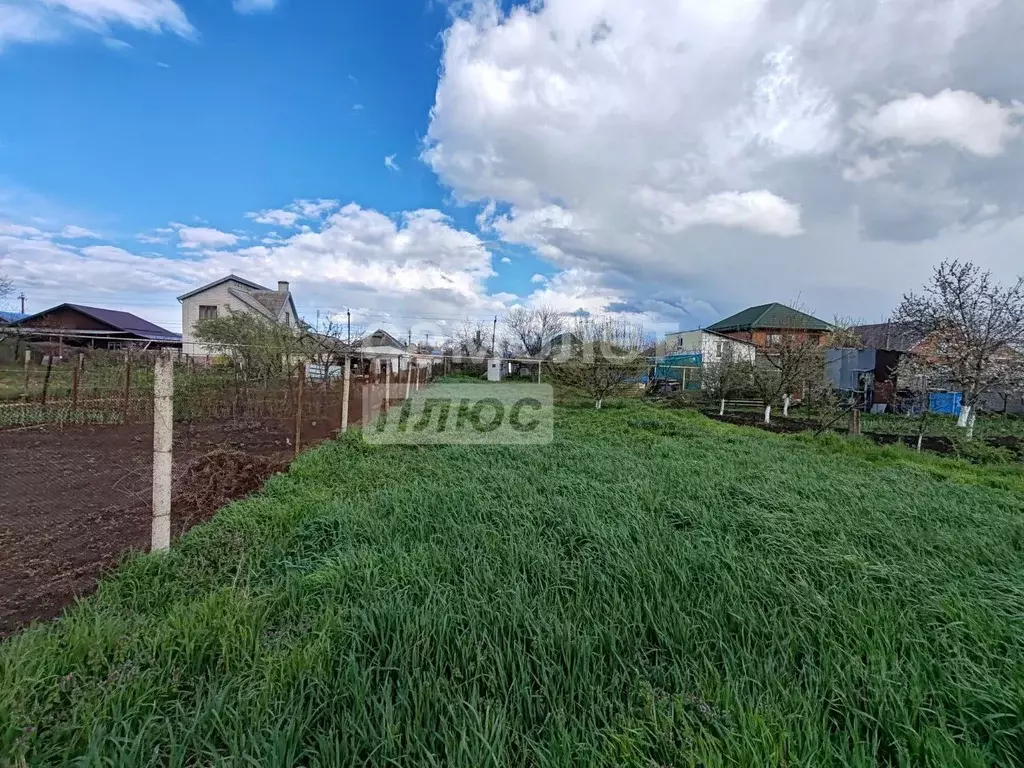 Участок в Краснодарский край, Динской район, Новотитаровская ст-ца ул. ... - Фото 1