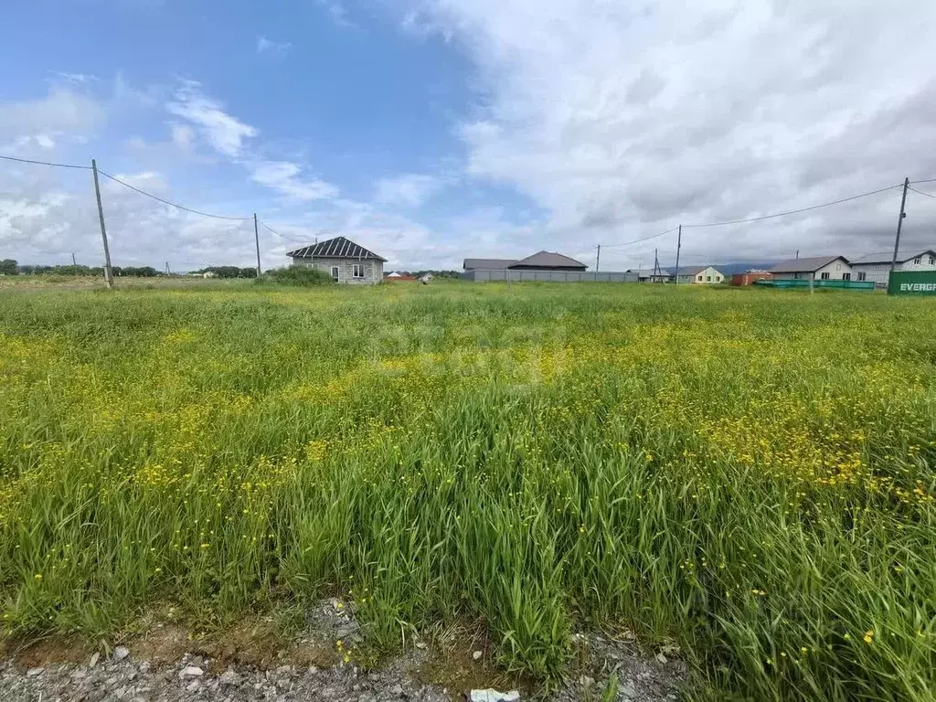 Участок в Сахалинская область, Южно-Сахалинск городской округ, с. ... - Фото 1