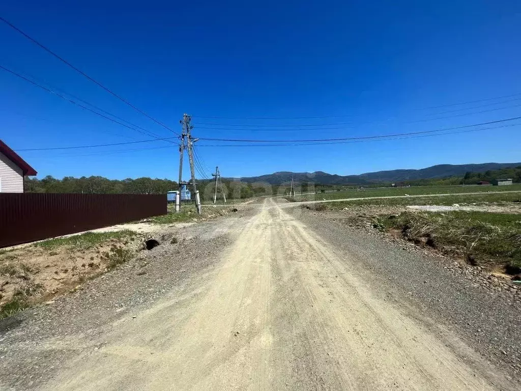 Участок в Сахалинская область, Южно-Сахалинск городской округ, с. ... - Фото 1