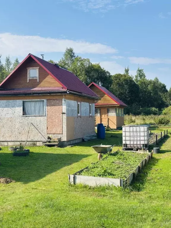 Дом в Новгородская область, Парфинский район, Федорковское с/пос, д. ... - Фото 1