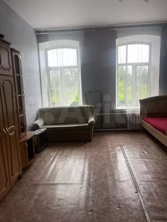 Комната 25 м в 4-к., 1/3 эт. - Фото 0
