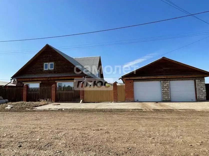 Дом в Иркутская область, Эхирит-Булагатский район, пос. Усть-Ордынский ... - Фото 1