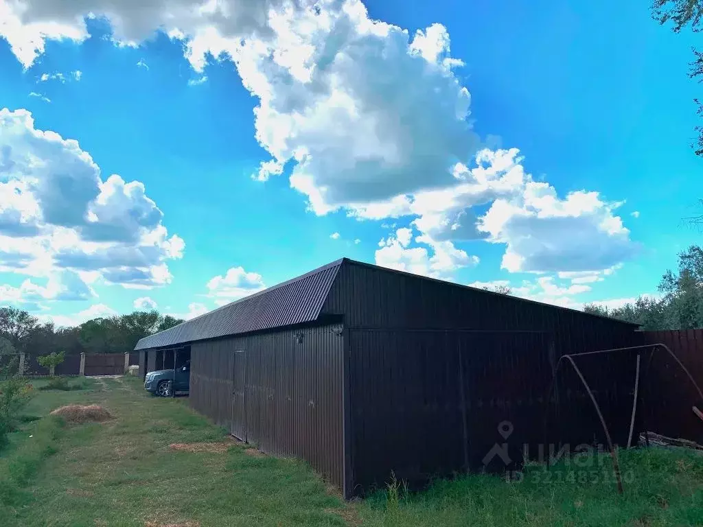 Дом в Астраханская область, Камызякский район, с. Караульное ул. ... - Фото 2
