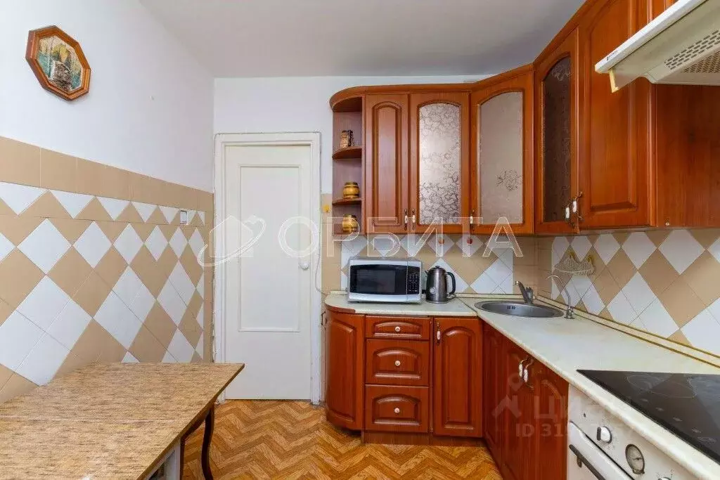 3-к кв. Тюменская область, Тюмень ул. Домостроителей, 12 (66.3 м) - Фото 1