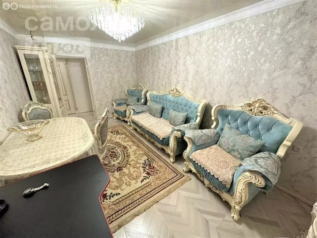 2-комнатная квартира: Грозный, улица Хамзата У. Орзамиева, 30 (58 м) - Фото 1