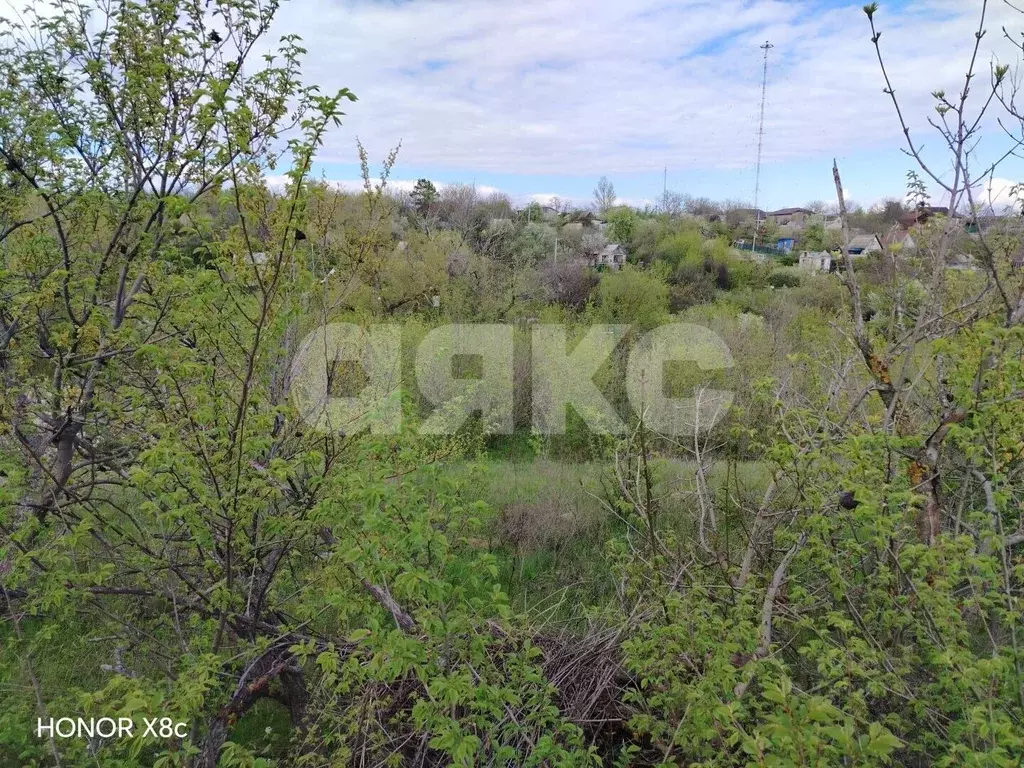 Участок в Волгоградская область, Волгоград ул. Солнечникова (7.0 сот.) - Фото 1
