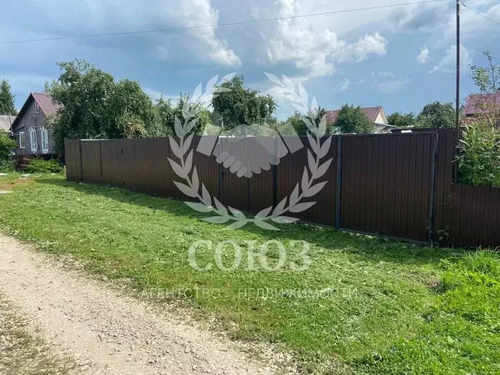 Участок в Калужская область, Сухиничи ул. Коминтерна, 33 (6.1 сот.) - Фото 1