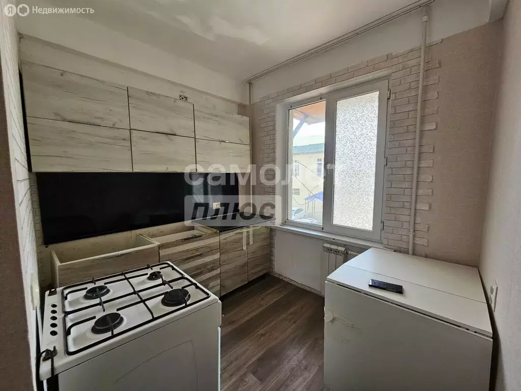 3-комнатная квартира: Махачкала, улица Ирчи Казака, 116А (47.9 м) - Фото 1