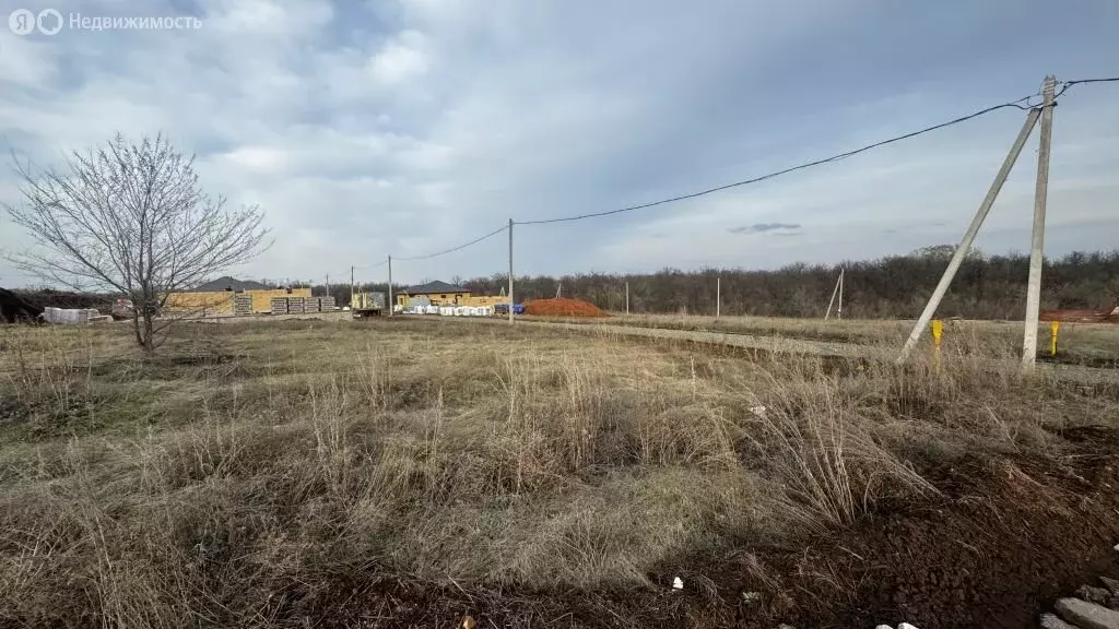 Участок в Оренбургский район, посёлок Соловьёвка (10 м) - Фото 0