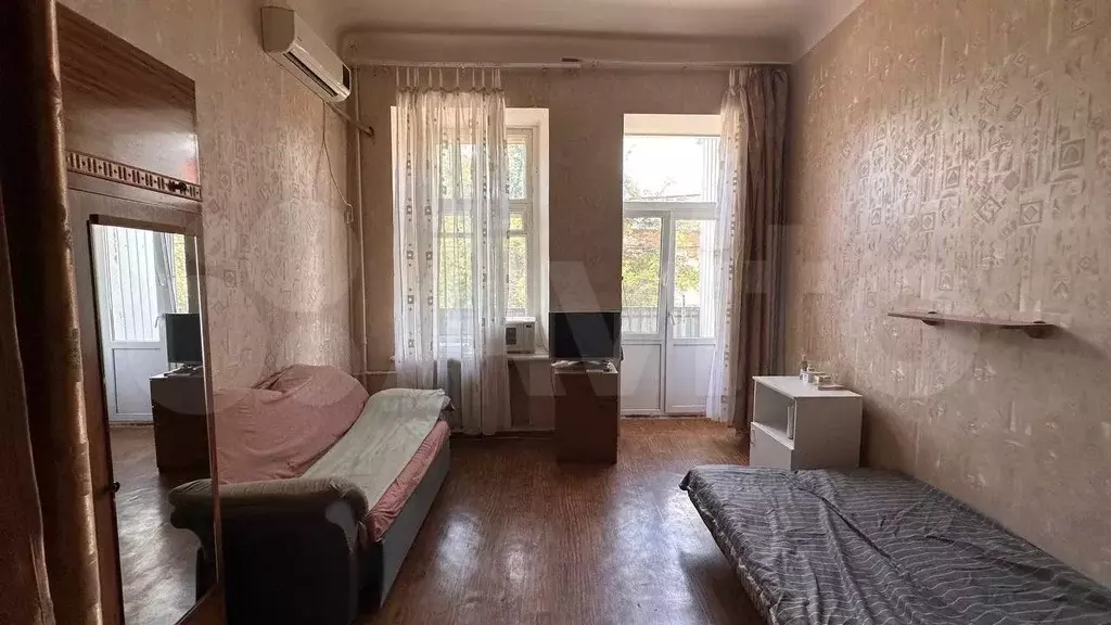 Комната 22 м в 4-к., 2/4 эт. - Фото 0