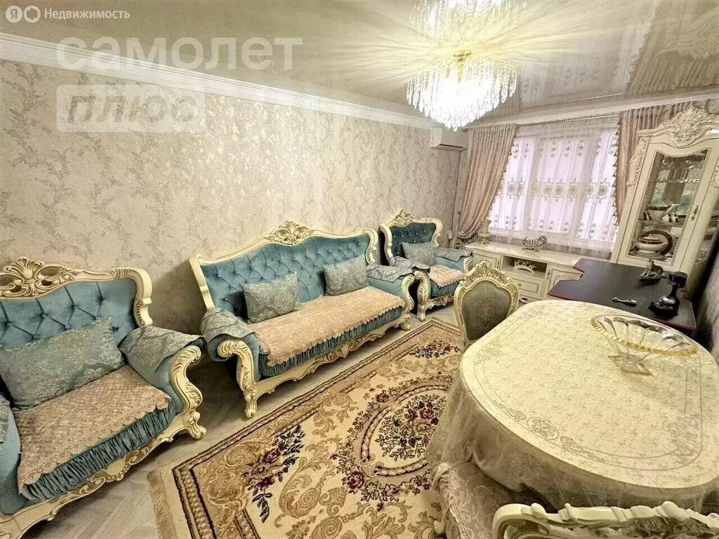 2-комнатная квартира: Грозный, улица Хамзата У. Орзамиева, 30 (58 м) - Фото 0
