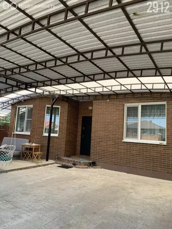 Дом в станица Новотитаровская, проезд 8 Марта (100 м) - Фото 1