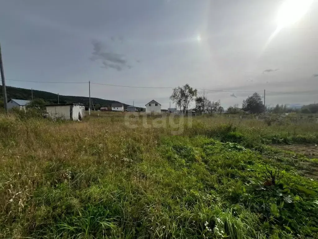 Участок в Сахалинская область, Южно-Сахалинск городской округ, с. ... - Фото 1