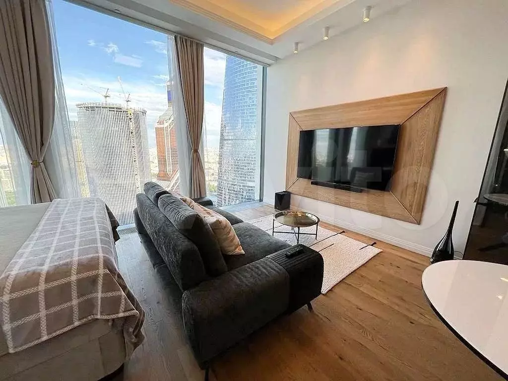 Апартаменты-студия, 52 м, 50/78 эт. - Фото 1