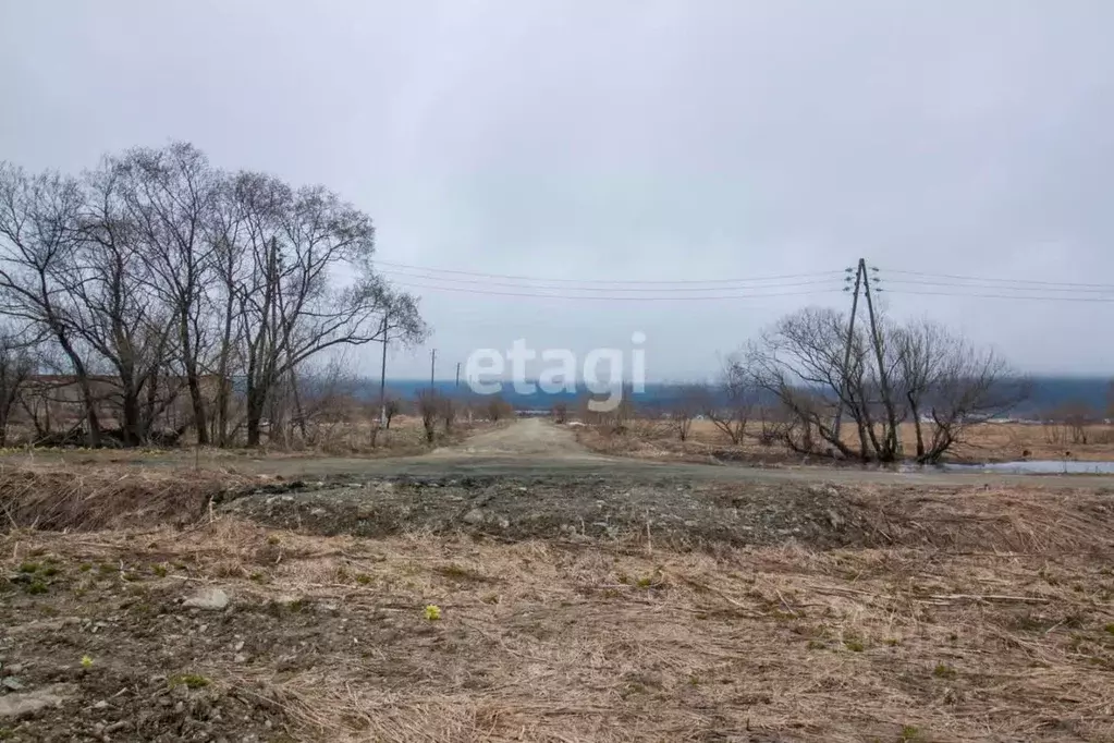 Участок в Сахалинская область, Южно-Сахалинск городской округ, с. ... - Фото 1