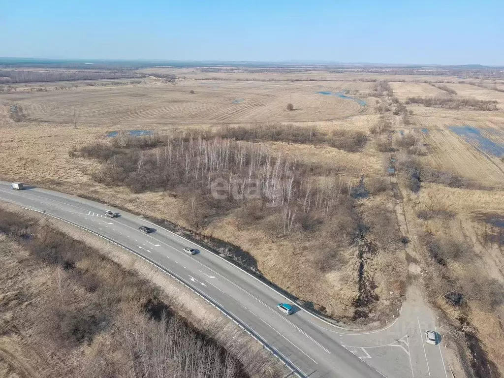 Участок в Еврейская автономная область, Смидовичский район, с. ... - Фото 1