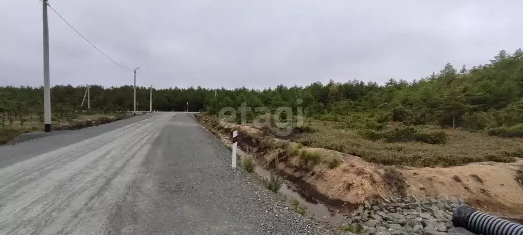 Участок в Сахалинская область, Корсаковский городской округ, с. ... - Фото 0