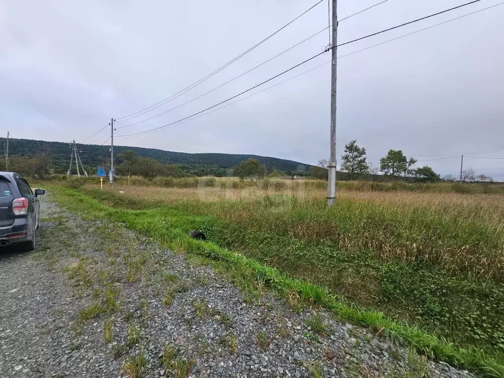 Участок в Сахалинская область, Южно-Сахалинск городской округ, с. ... - Фото 1