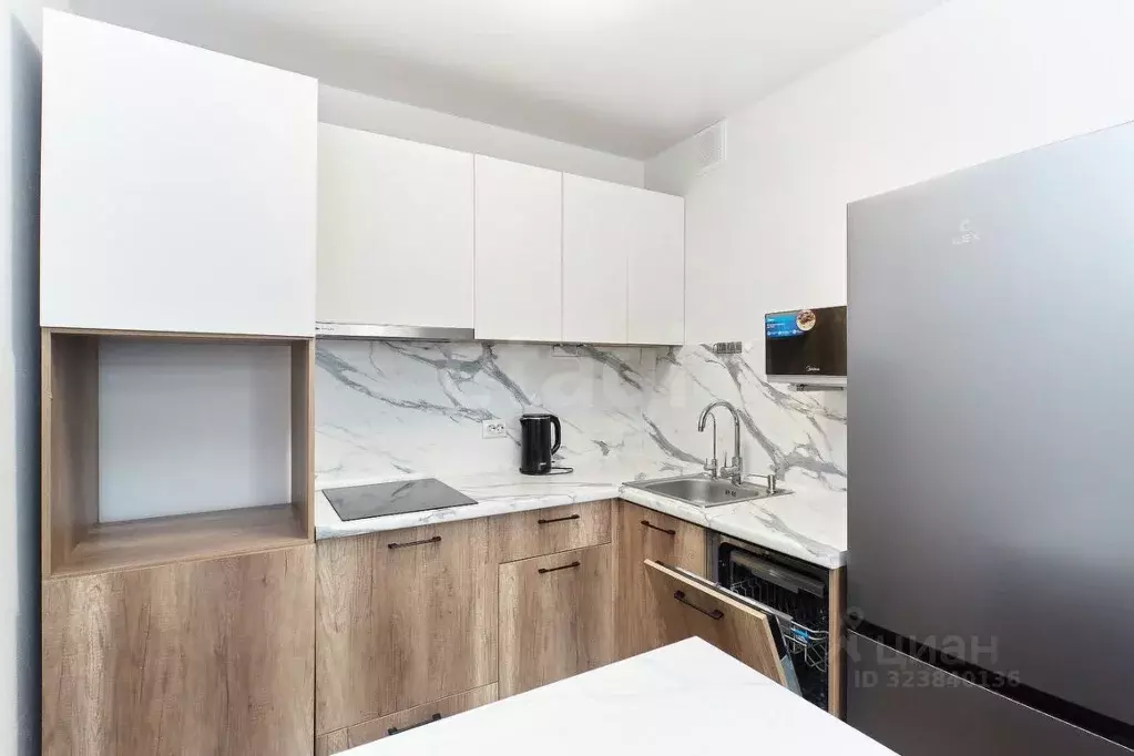 1-к кв. Тюменская область, Тюмень ул. Первооткрывателей, 8 (37.4 м) - Фото 1