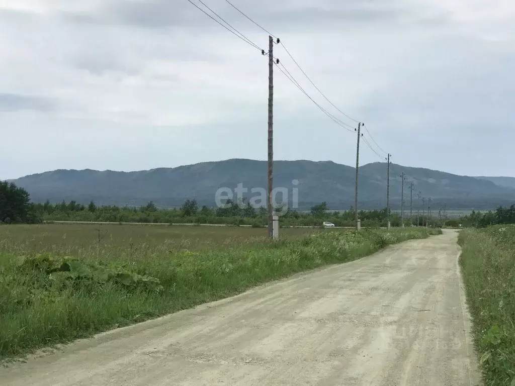 Участок в Сахалинская область, Южно-Сахалинск городской округ, с. ... - Фото 1