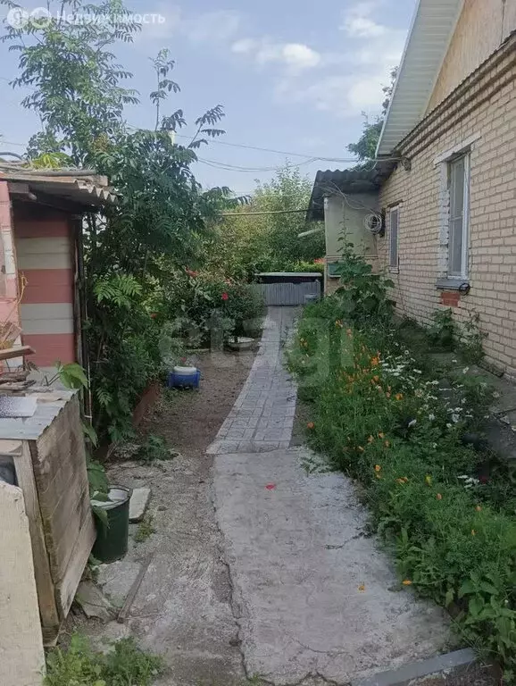 Дом в Уйское, улица Строителей (80 м) - Фото 1