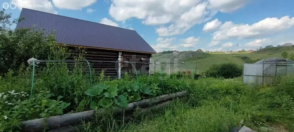 Дом в Усть-Катав, улица Карла Маркса (10 м) - Фото 1